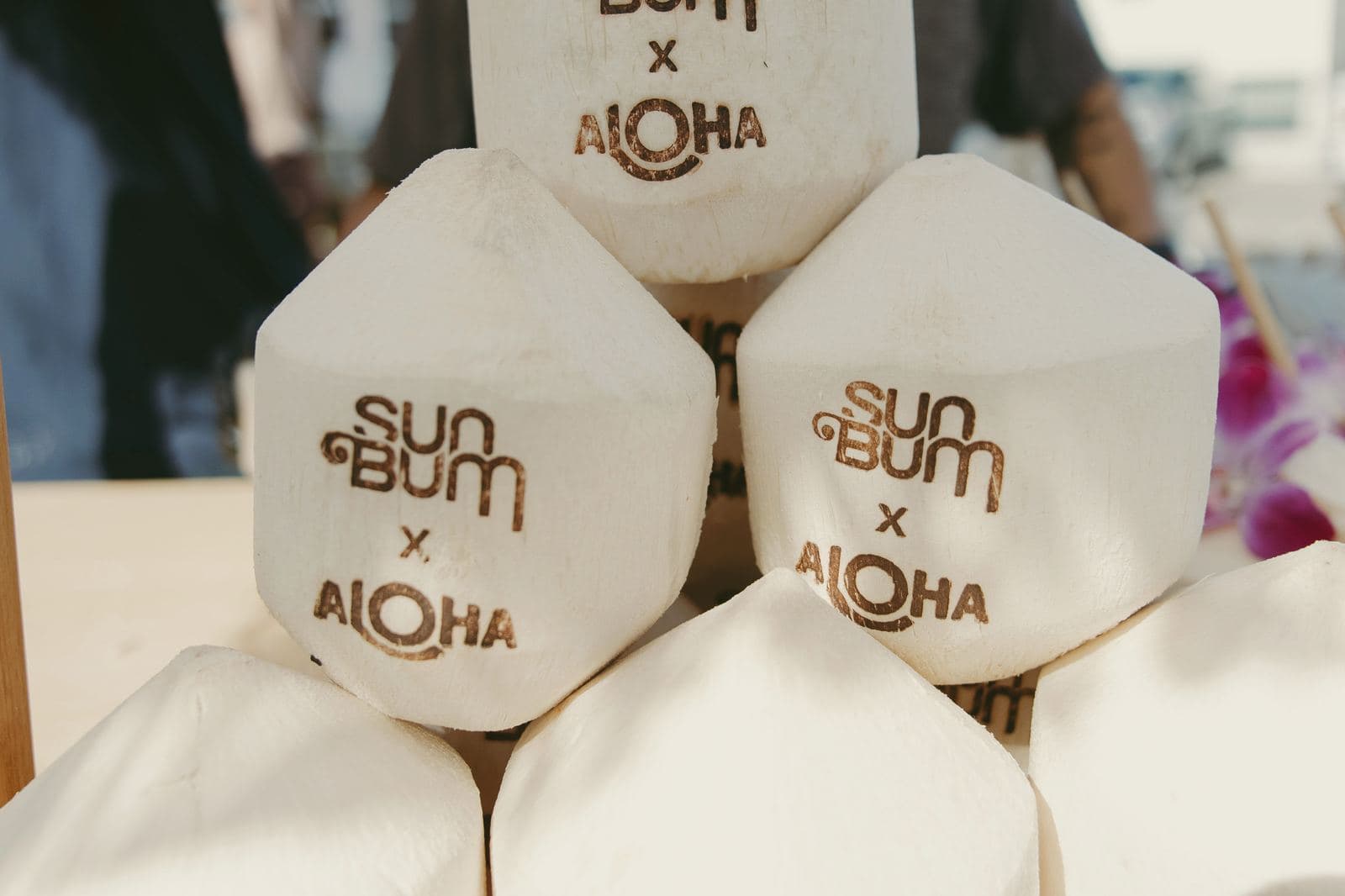 Co-branded Sun Bum x Aloha coconuts