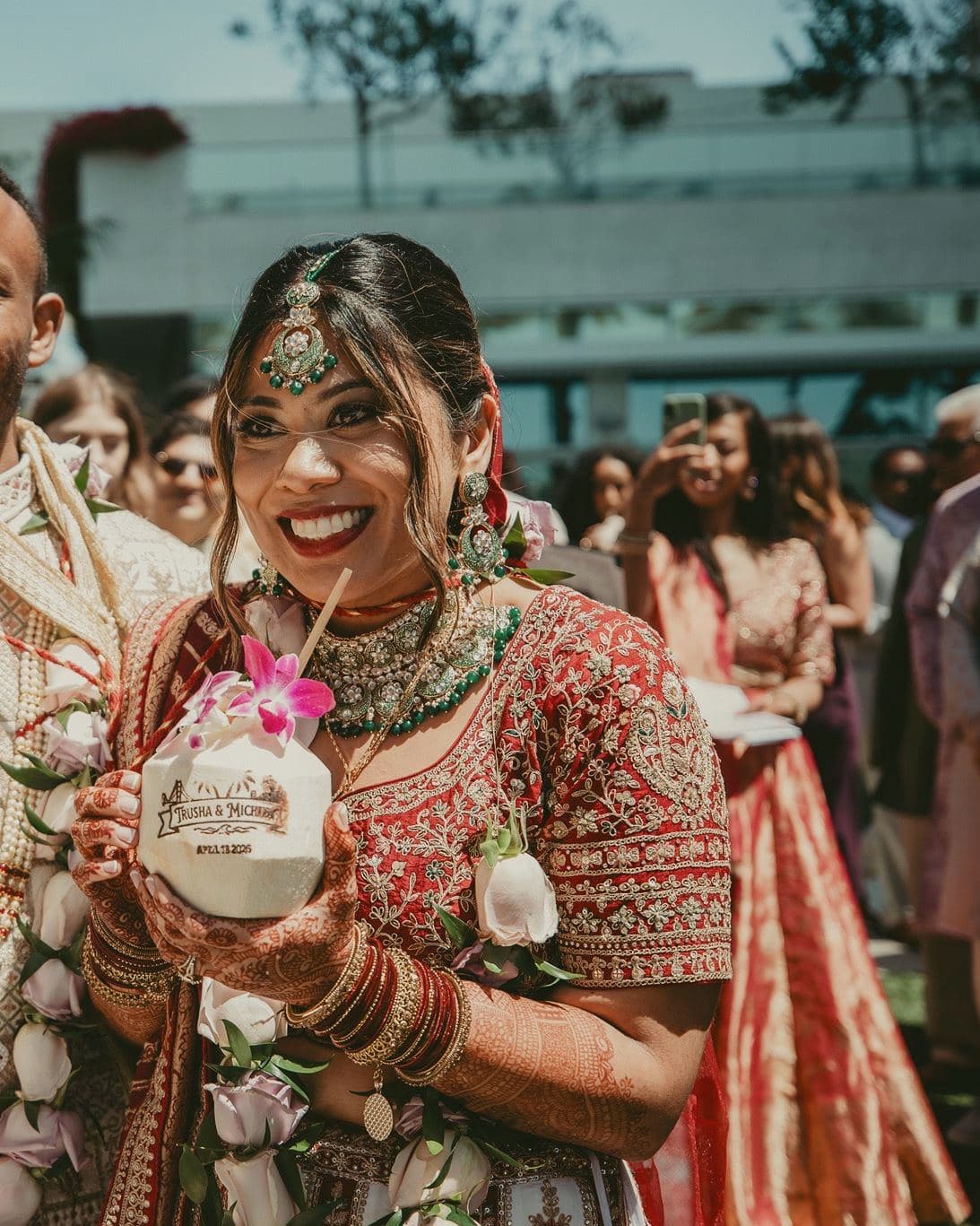Bride celebrating with a stamped coconut